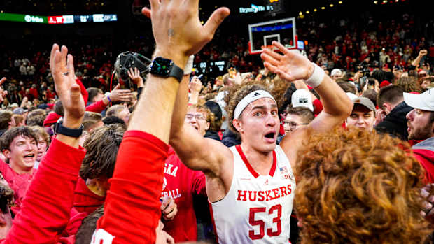 The Nebraska Cornhuskers celebrate after defeating the Purdue Boilermakers at Pinnacle Bank Arena.